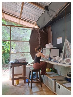 Person sitting In the TCP field laboratory 
