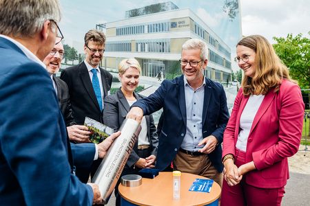 As a legacy for future generations, a time capsule containing documents and memorabilia is being sealed into the building. 