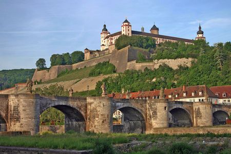 The old bridge and the Fortress Marienberg are prominent landmarks on the Main river in Würzburg.