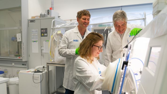 Prof Jörg Vogel, Dr Gunther Schunk, and Valentina Cosi in the lab